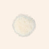 Round textured rug with a subtle pattern on a light beige background