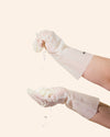 Reusable makesy nitrile gloves laid flat, showing cream colour and durable construction for lye and chemical handling