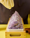 Complete cold process soap making starter kit contents including oil blend, tools, and The Bubble Book