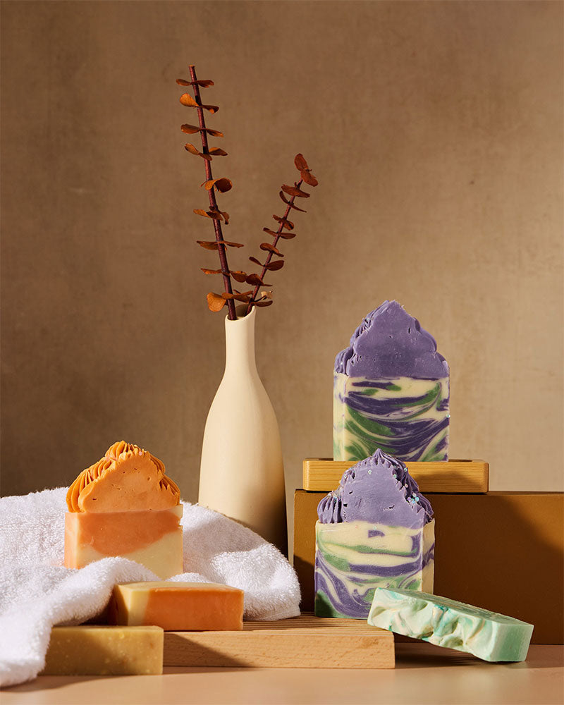 Close-up of moisturising cold process soap bars topped with soap frosting from the Royalty Soaps kit