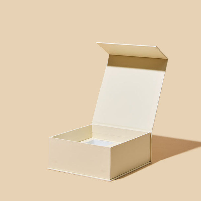 Beige gift box on a beige background