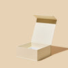 Beige gift box on a beige background
