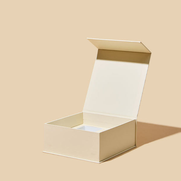 Beige gift box on a beige background