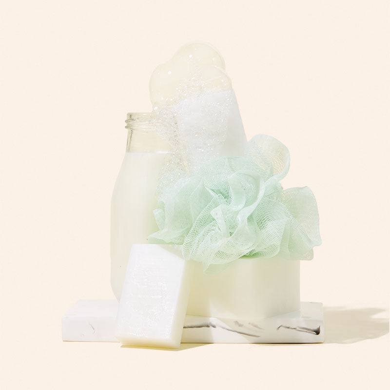 Makesy shea butter and goat milk melt and pour soap base block on a clean surface