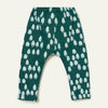 Close-up of the snowy pine tree print on Mon Coeur's forest green recycled cotton kids jogger