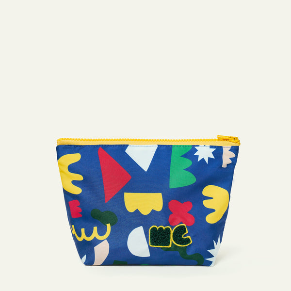 Colorful pouch with geometric patterns on a white background