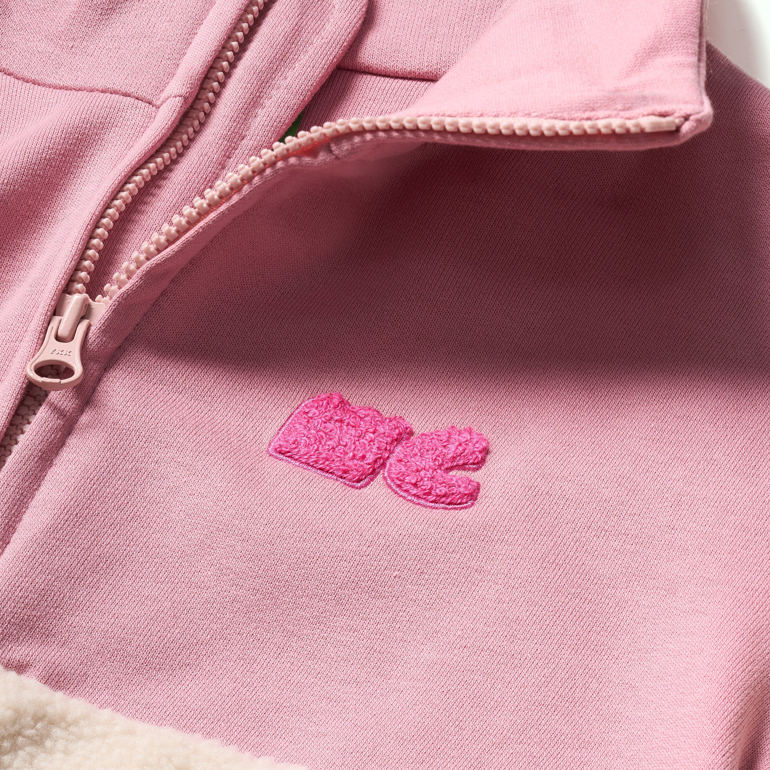 Close-up of Mon Coeur Pink Sherpa Zip Up plush sherpa texture and contrast pink yoke detail