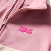 Close-up of Mon Coeur Pink Sherpa Zip Up plush sherpa texture and contrast pink yoke detail
