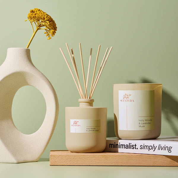 Collection of 8oz Aura® diffuser vessels styled together showing cohesive home fragrance line
