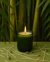Close-up vertical shot of makesy eco-friendly bamboo candle wicks showing round braided design and metal sustainer tabs