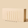Makesy bamboo candle wicks made from 100% natural bamboo pulp and fiber, pre-tabbed and pre-clipped, laid flat on a neutral surface
