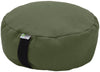 Green meditation cushion with a visible brand label on a white background