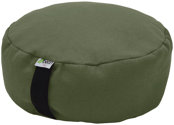 Green meditation cushion with a visible brand label on a white background