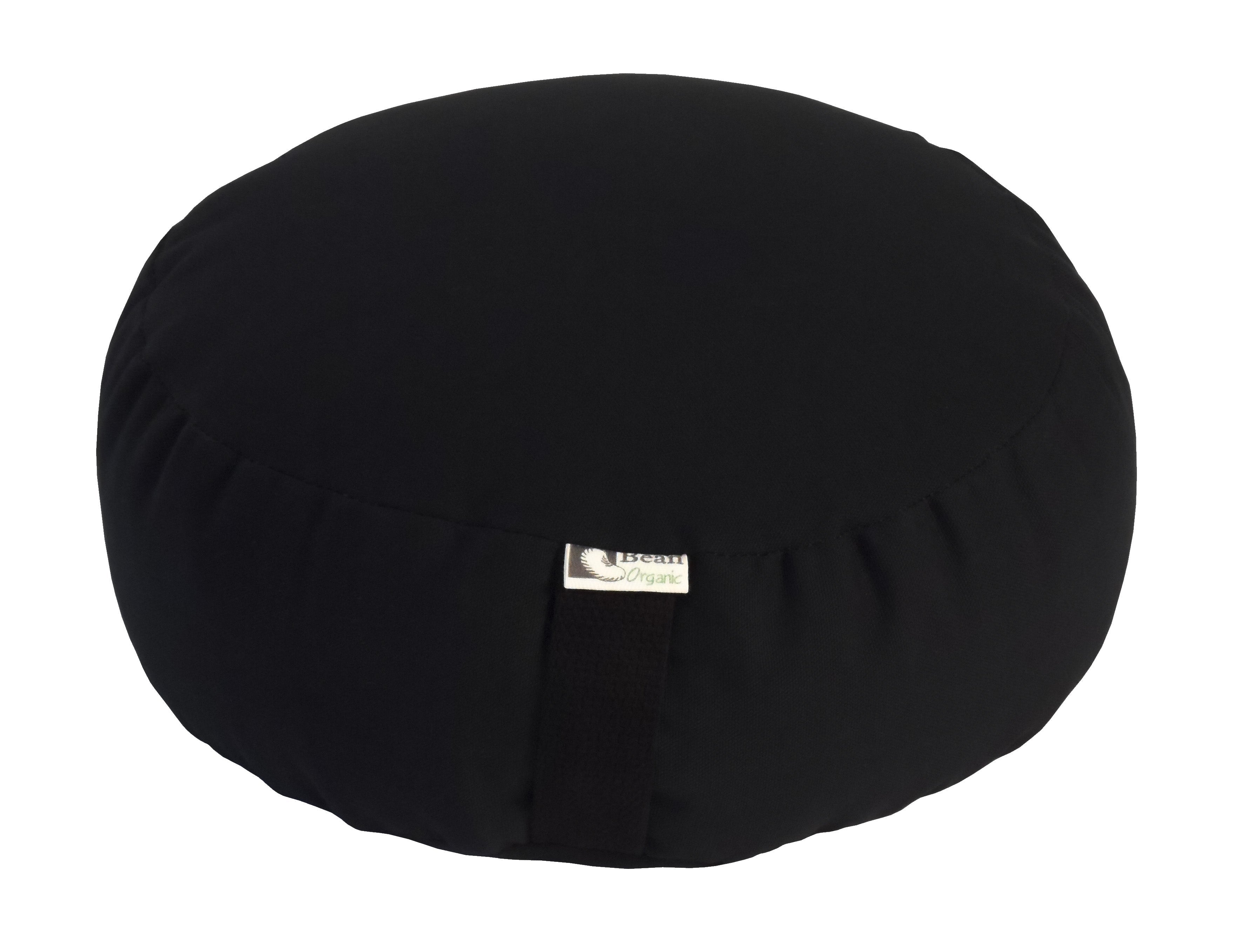 Black meditation cushion with a brand label on a white background