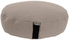 Beige meditation cushion with a visible brand tag on a white background