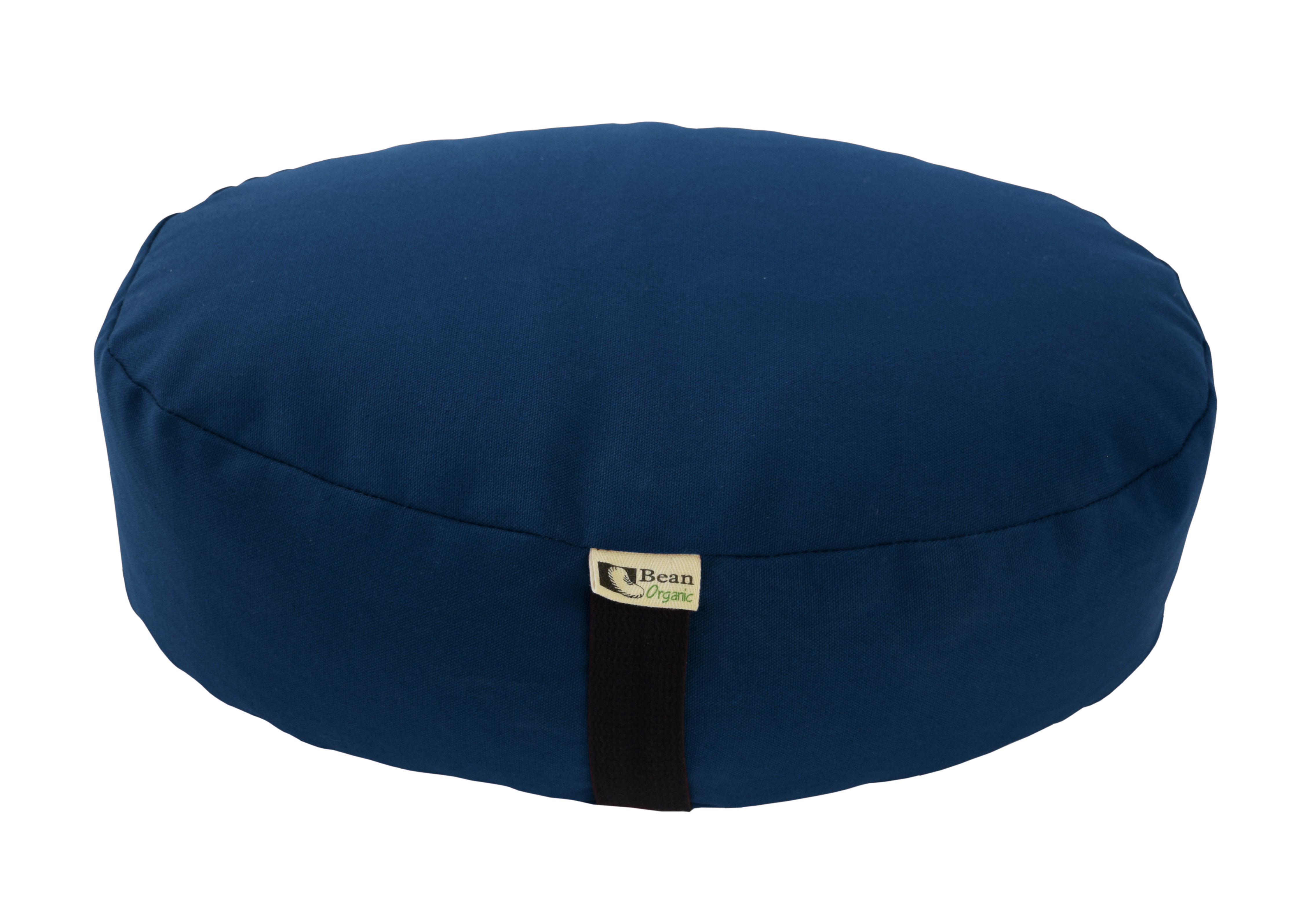 Blue meditation cushion with a brand label on a white background