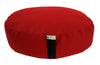 Red meditation cushion with a black strap on a white background