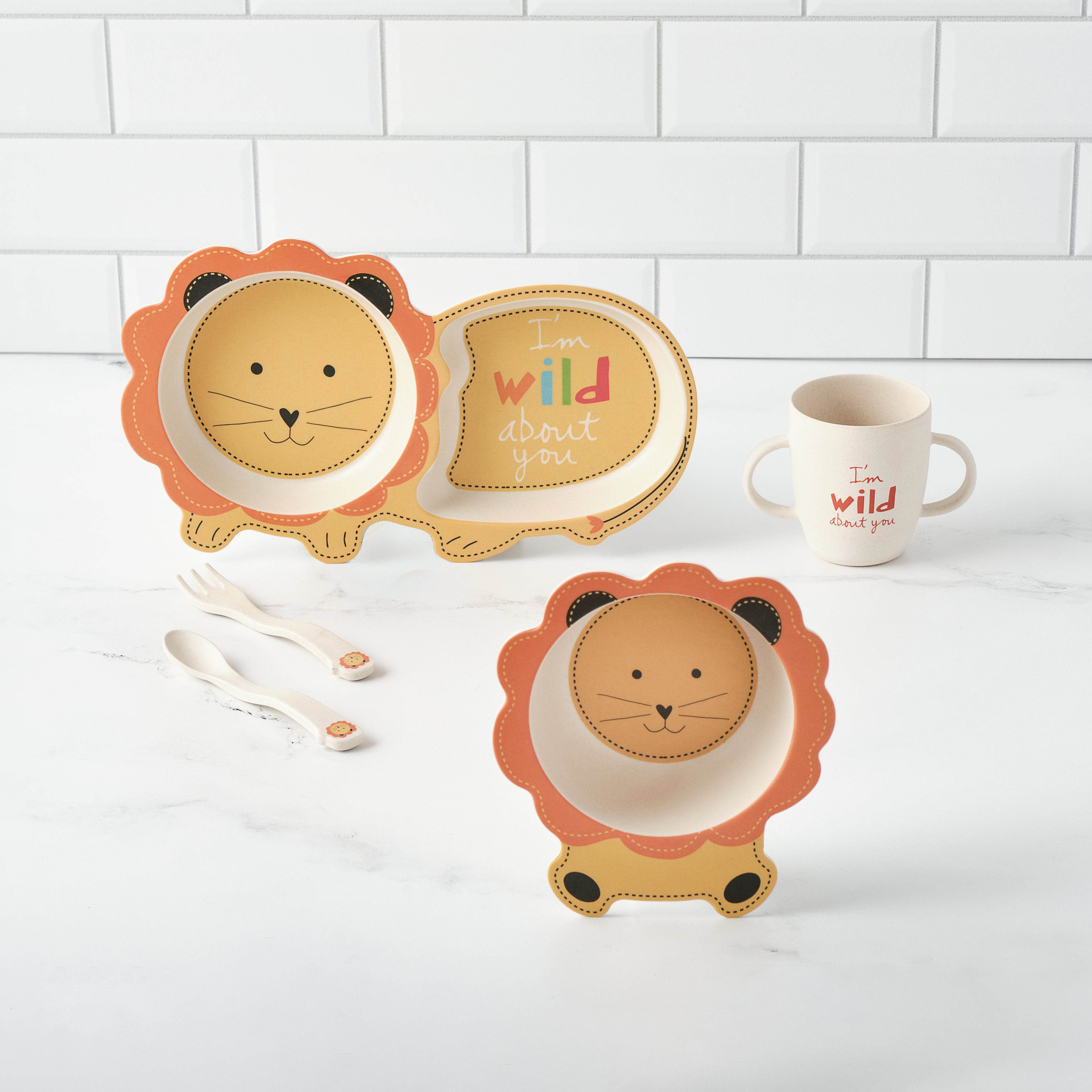 Ryan the Lion bamboo dinnerware set for kids! Eco-friendly, safe plates & bowls, dishwasher safe. Fun mealtime adventures. Bamboozle Home. Shop now!
