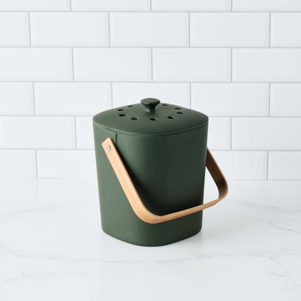 The Bamboozle Composter is a stylish and easy-to-use countertop compost bin that helps you reduce your food waste and help the environment. Made from bamboo fiber, this composter is dishwasher-safe, durable and sustainable. Dimensions: 8” x 6.25” x 9”. Order your Bamboozle Composter today!