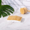 Desesh plant-based cellulose dish sponge being used to wash dishes in a kitchen sink