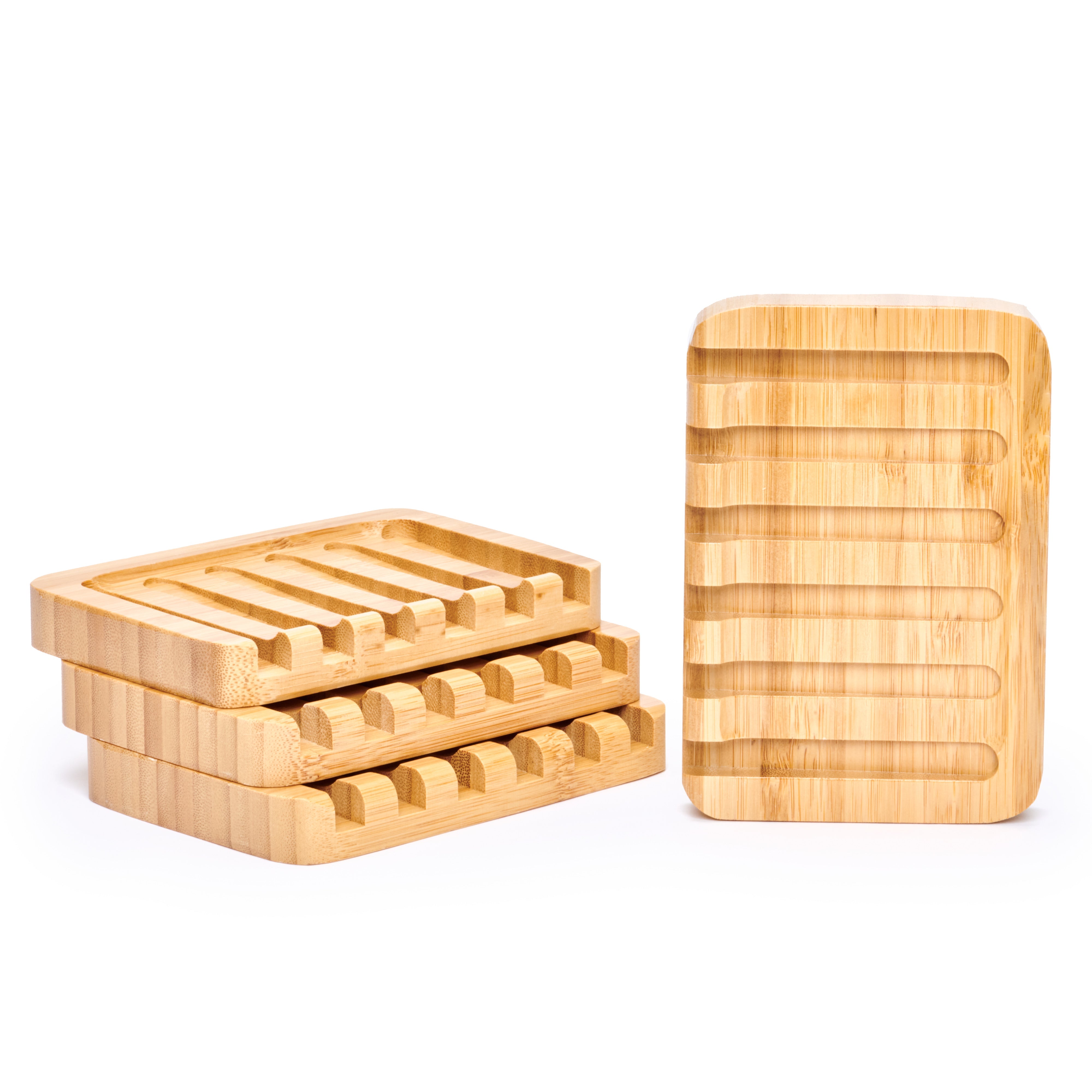Desesh bamboo self-draining soap dish with bar soap resting on waterfall slatted rack