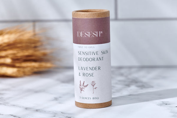 Desesh lavender and rose deodorant on a marble surface