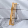 Close-up of natural bamboo hair comb teeth, smooth and gentle for all hair types