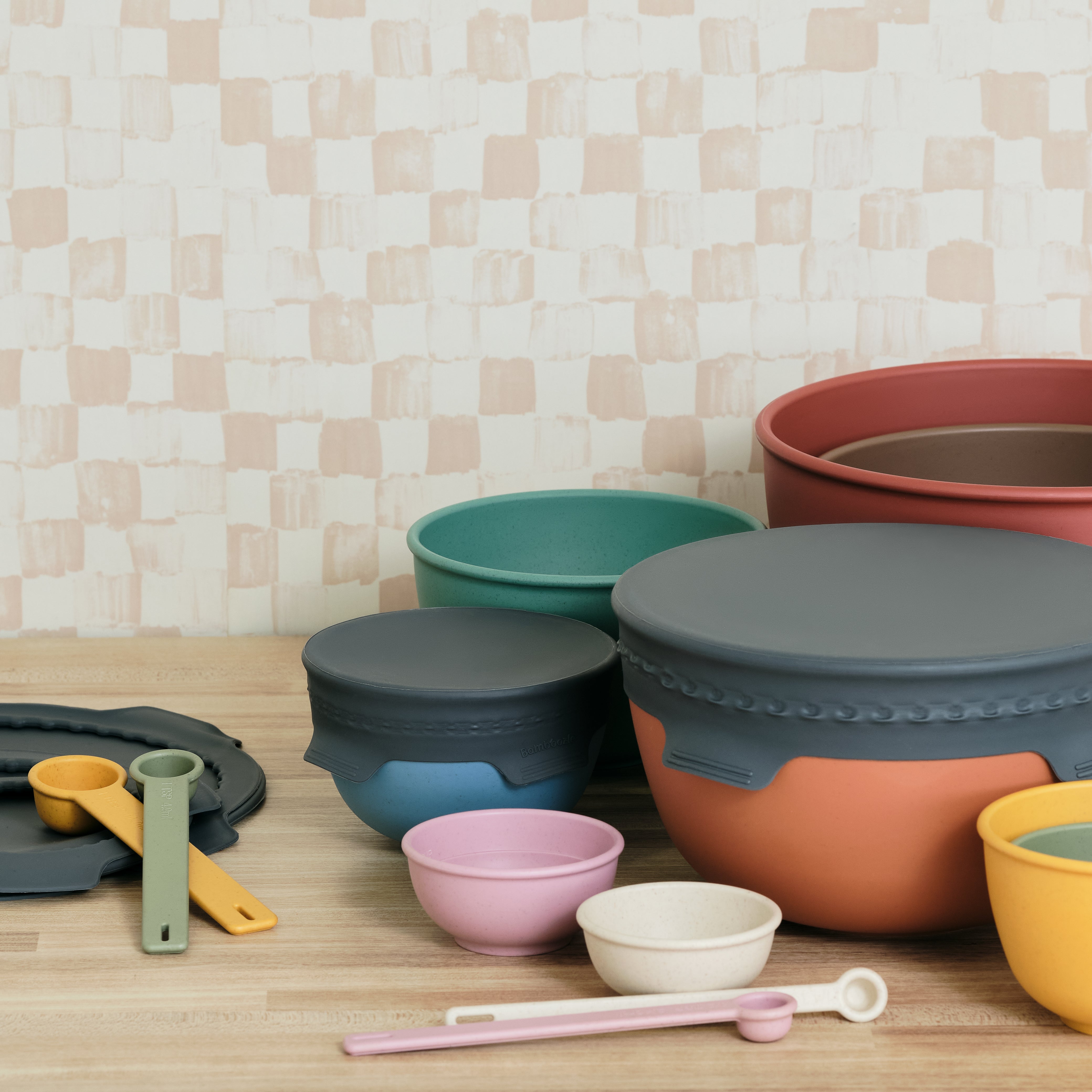 Bamboozle baking accessories bundle — mixing bowl lids and measuring tools displayed together
