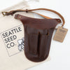 Genuine leather gardener's tool belt by Seattle Seed Company — a practical and lasting gift for gardeners
