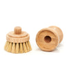 Desesh bamboo dish scrubbing brush with replaceable sisal fibre head on kitchen surface