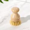 Close-up of replaceable head on Desesh bamboo dish scrub brush showing natural sisal bristles