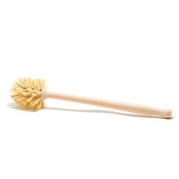 Desesh long handle bamboo and sisal toilet brush standing upright against a clean bathroom background