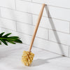 Close-up of natural sisal bristles on the Desesh bamboo toilet brush showing texture and colour variation