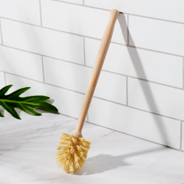 Close-up of natural sisal bristles on the Desesh bamboo toilet brush showing texture and colour variation