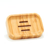 Desesh curved rectangular bamboo soap dish with slatted drainage design on a white background