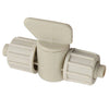 Beige plastic valve or connector on a white background