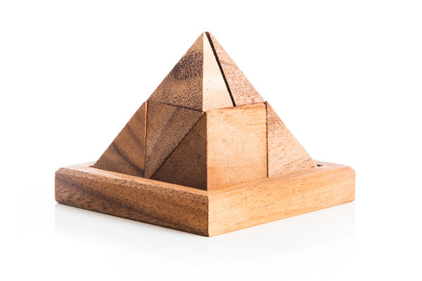 Wooden pyramid puzzle on a white background