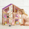 Sweetwood Unicorn dollhouse in soft purple tones, shown from the front