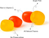 Close-up of Andy Anand fruit-flavored multivitamin gummies in strawberry, mango, pineapple, and peach