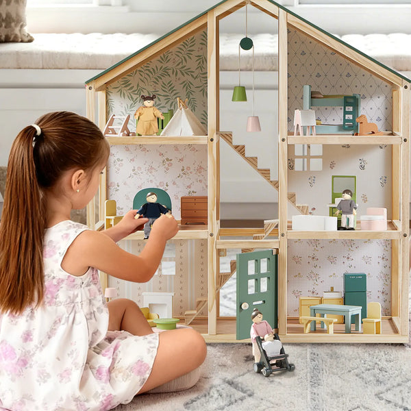 Tiny Land Sweetwood Evergreen dollhouse showing its three stories and furnished rooms