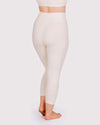 Woman wearing Thunderpants High Rise Ankle Length Leggings in Pomegranate Punch, back view