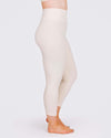 Woman wearing Thunderpants High Rise Ankle Length Leggings in Pomegranate Punch, side view