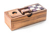 Wooden puzzle box with geometric shapes on a white background