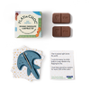 Play'n Choc organic chocolate and surprise toy packaging with a dolphin-shaped toy and educational card.
