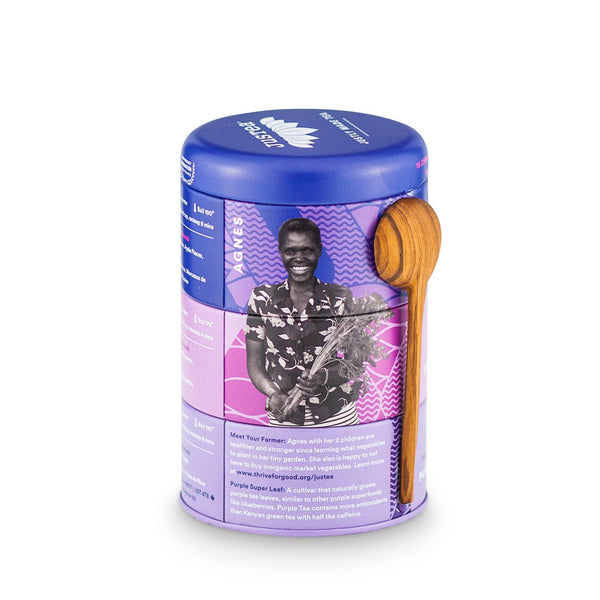 Tea canister with a purple label featuring an image of a person and text, on a white background.
