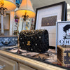 Close-up of The Grand Couture high-fashion inspired sculptural candle by Onali Pure