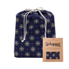 Reusable 22-inch cotton canvas gift bag with Fair Isle geometric snowflake design by artist Kelsey Weigl