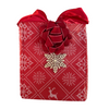 EverWrap reusable snowflake charm shown as a decorative gift tag for eco-friendly wrapping