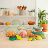 Food Huggers silicone food huggers in five sizes covering cut fruit and vegetables to keep them fresh