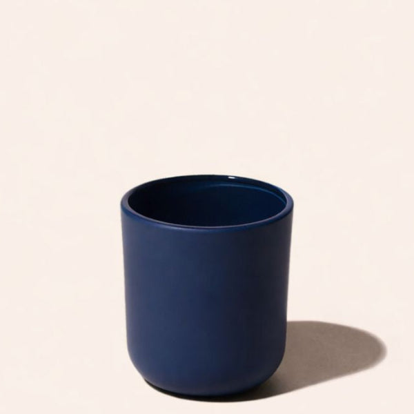 Close-up of 2.5oz Aura® candle vessels showing matte and gloss colour options for small-batch candle making